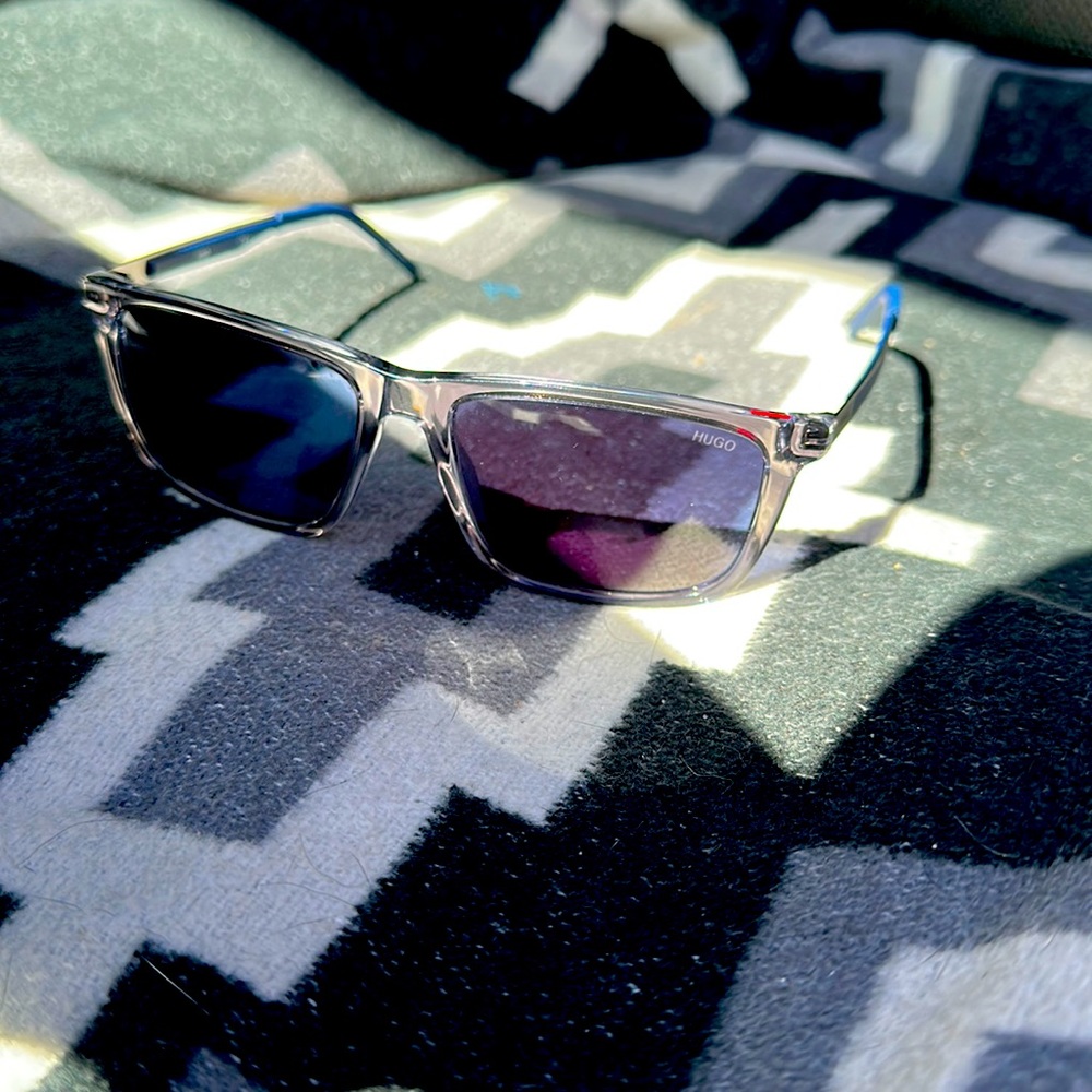 Hugo Boss sunglasses, clear blue square frame, blue lenses.